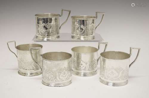 Matched set of six Persian (possibly Isfahan) white metal lemon tea holders, having typical