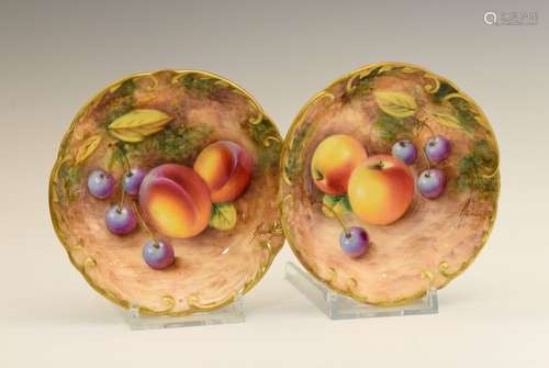 Pair of Royal Worcester porcelain pin dishes, signed Roberts, one painted with apples and