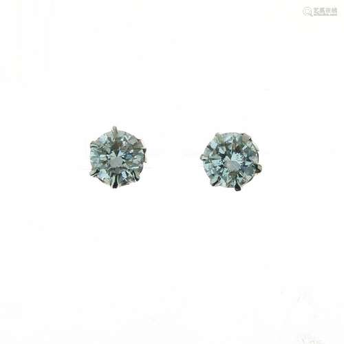 Pair of diamond single stone earstuds, the brilliant cuts totalling approximately 0.9 carats, 1.6g