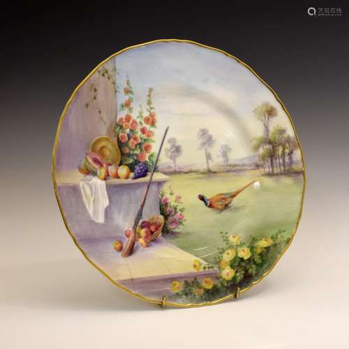 Royal Worcester porcelain plate, of wavy-edged form with gilt rim, the field decorated with a cock