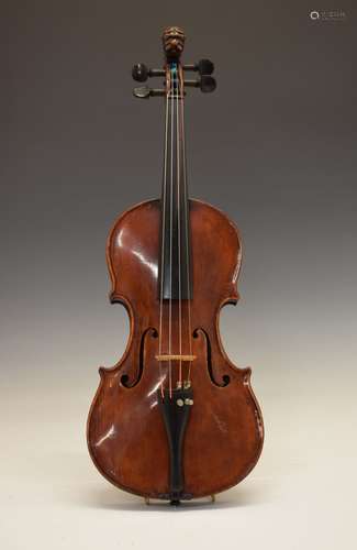 Late 19th Century violin, well-carved lion headed terminal with protruding red-painted tongue, two-