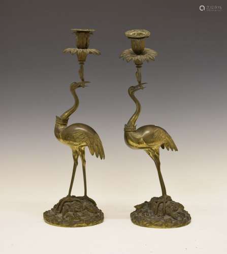 Pair of 19th Century bronze candlesticks, after a design by Thomas Abbott (d.1849), modelled in