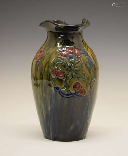 Elton Ware ovoid vase, having foliate decoration on a mottled blue, yellow and green ground, base