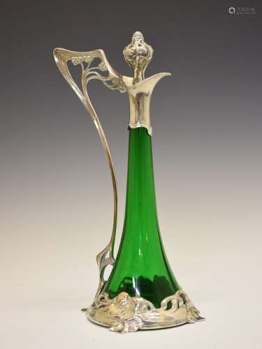 Art Nouveau WMF claret jug and stopper, No.191, with trumpet-form green glass body, pierced berry