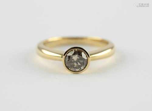 SOLITÄRRING, 585/ooo Gelbgold, besetzt mit einem Brillanten von ca. 0,75 ct., p1 - braun, RG 55, 4,