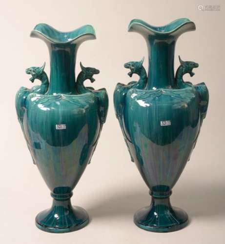Paire de vases en faïence glaçurée turquoise munis…