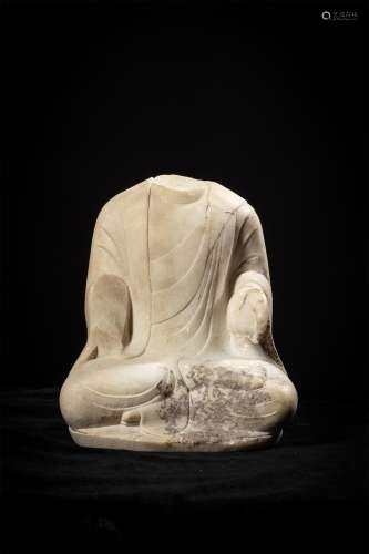 A Chinese Stone Sitting Buddha