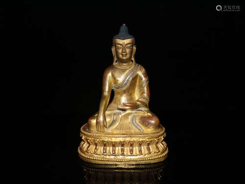 A Chinese Bronze Gilding Statue of Sakyamuni