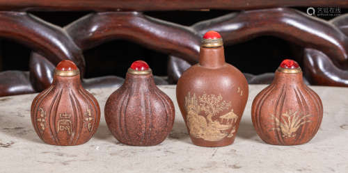 Set of four Chinese Yixin Zisha Snuff Bottles