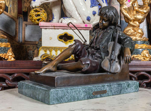 Bronze figure on marble stand