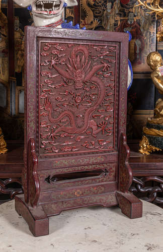 Important Chinese carved cinnabar screen