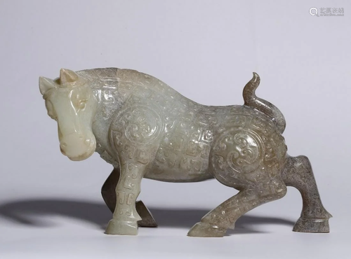 A CHINESE FINE WHITE JADE MYTHICAL BEAST…