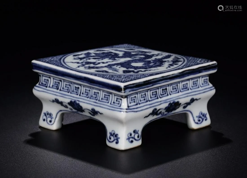 A SMALL CHINESE BLUE AND WHITE TABLE DESK…