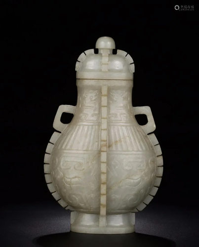 A CHINESE FINE WHITE JADE VASE WITH COV…