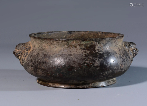 A CHINESE BRONZE CENSER WITH LION HANDLE…