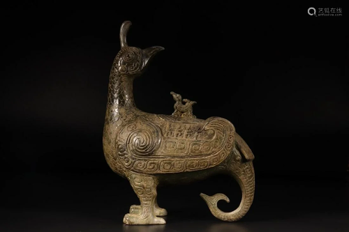 A CHINESE ARCHAIC BRONZE WINE VESSEL, ZUN,…