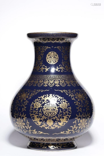 A CHINESE GILT-DECORATED BLUE-GLAZED VA…