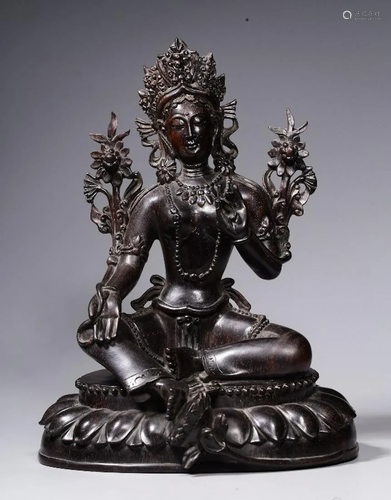 A CHINESE ZITAN WOOD FIGURE OF TARA, QI…