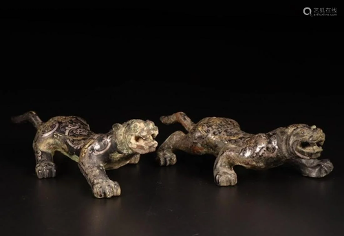 A PAIR OF CHINESE SILVER GILT-BRONZE MYTHIC…