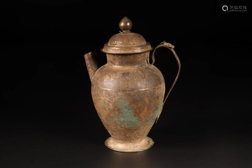 A CHINESE GILT-SILVER WINE EWER, TANG DYNASTY