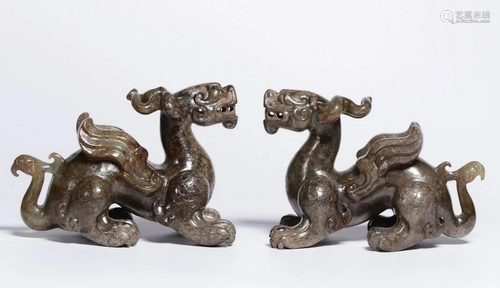 A PAIR OF CHINESE FINE WHITE JADE MYTHICAL …