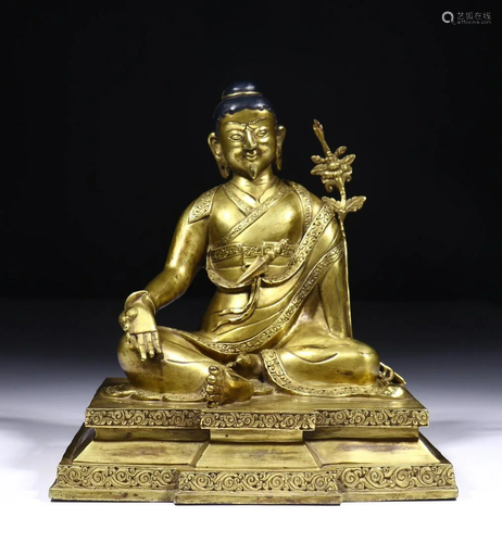 A CHINESE GILT-BRONZE FIGURE OF TSONGK…