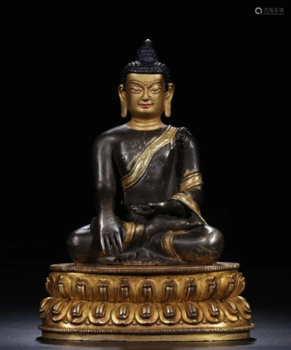 A CHINESE GILT-BRONZE FIGURE OF SEATED S…