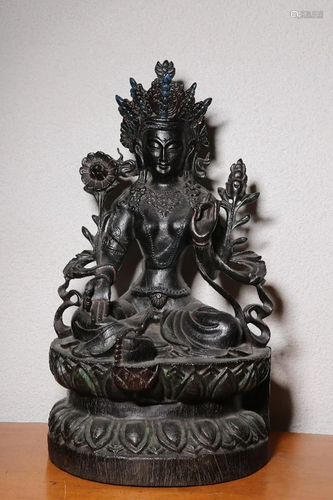 A CHINESE ZITAN WOOD FIGURE OF TARA, QI…