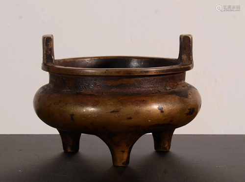 A CHINESE BRONZE TRIPOD CENSER WITH XUAN…