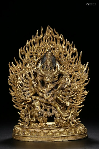 A CHINESE GILT-BRONZE FIGURE OF YAMANT…