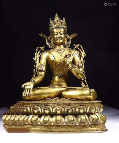 A CHINESE GILT-BRONZE FIGURE OF TARA, QI…