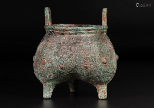 A CHINESE ARCHAIC BRONZE TRIPOD VESSEL(DIN…