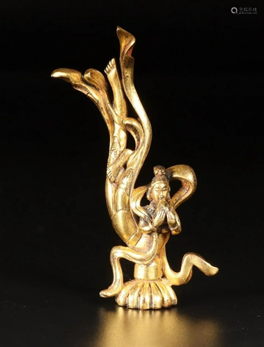 A CHINESE GILT-BRONZE FIGURE OF FLYING …