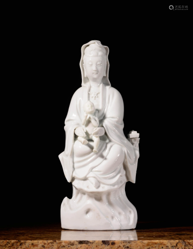 A CHINESE BLANC DE CHINE FIGURE OF GUANYIN,…