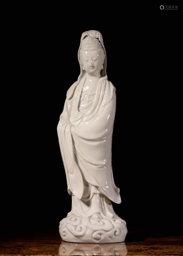 A CHINESE BLANC DE CHINE FIGURE OF GUANYIN,…