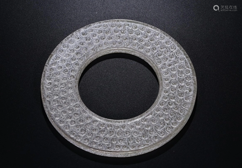 A CHINESE FINE WHITE JADE DISC, BEFORE M…