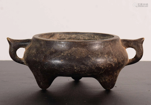 A CHINESE BRONZE TRIPOD CENSER WITH XUAN…