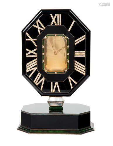 A CARTIER CITRINE, ONYX, SILVER AND DIAMOND 'MYSTERY CLOCK', CASE NO. 201207, CIRCA 1970S