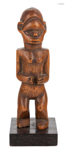 A HARDWOOD BEMBE FIGURE, CONGO