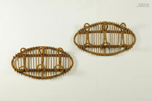 MANIFATTURA ITALIANA Pair of coat hangers (2).