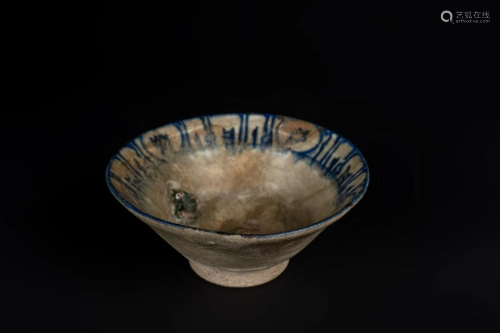 Arte Islamica A pottery bowl with blue pseudo