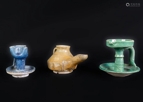 Arte Islamica Three glazed pottery lamps Iran and