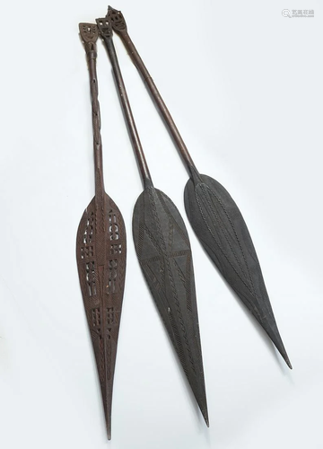 THREE EARLY CARVED TRIBAL CEREMONIAL SPEARS