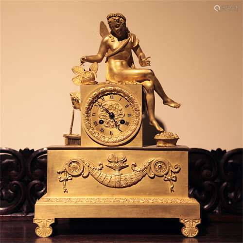 A French Gilt Bronze Clock