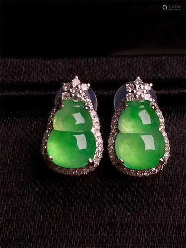 A Pair of Chinese Carved Jadeite Earrings