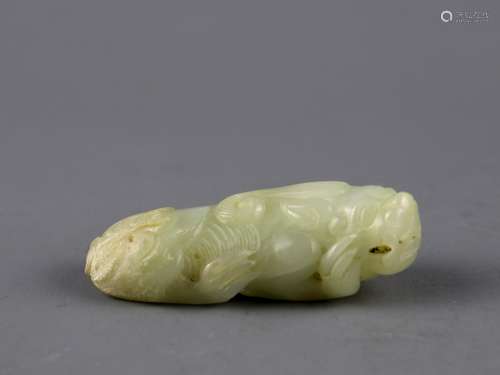 A Chinese Carved Jade Foo-Dog