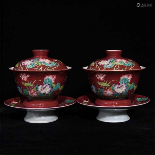A Pair of Chinese Red Ground Famille-Rose Porcelain Cups with Covers and Plates