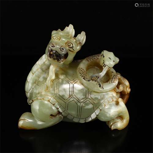 A Chinese Carved Jade Foo-Dog