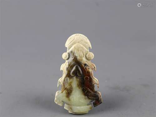 A Chinese Carved Jade Foo-Dog