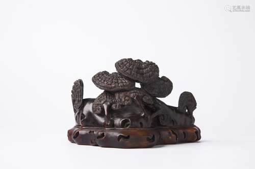 A Chinese Carved Zitan Brush Rest